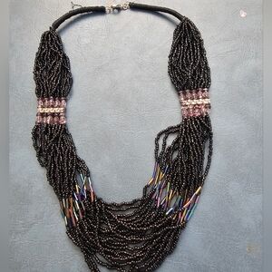 Sophisticated Black Beaded Necklace with Purple Accents